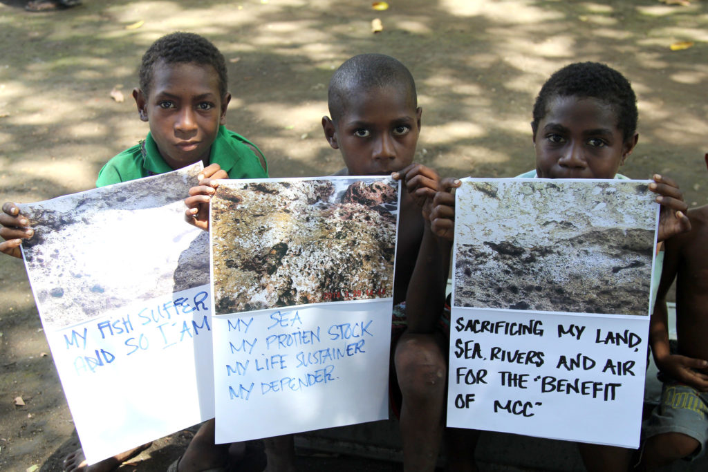 Boys in a community impacted by Ramu mine