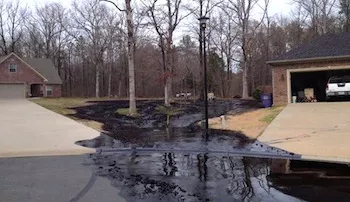 Oil spilled from ExxonMobile's Pegasus pipeline in Mayflower, Arkansas March 2013