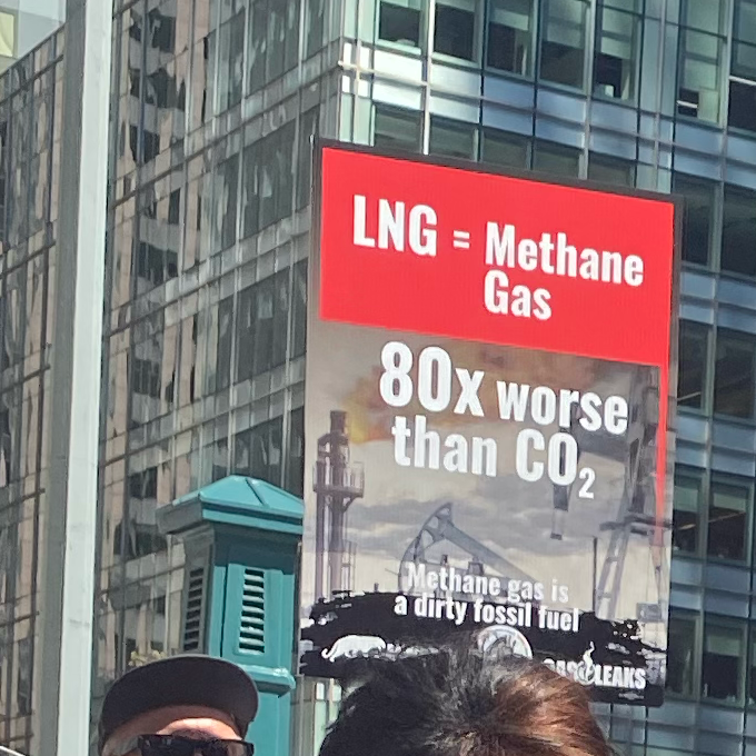 Protest sign: LNG = Methane Gas 80 times worse than CO2