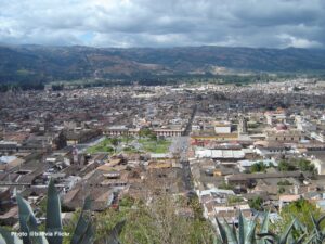 City neighborhoods with mountains beyond